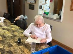 Woman sitting and reading