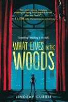 Cover image for What Lives in the Woods