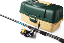 Green and cream colored tacklebox with a fishing rod