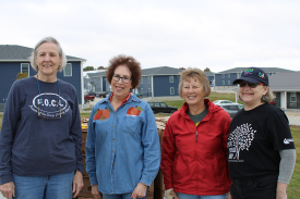 four members of the Friends of Osage County Library smiling in a group photo