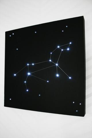 Image of led lights in a constellation formation on a black canvas