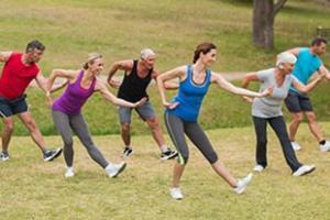 seniors doing tai chi outside