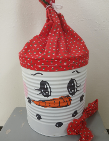 Snowman made out of a large coffee can
