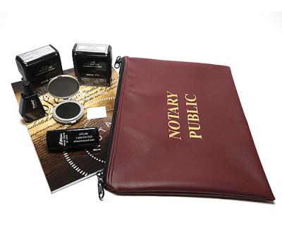 Notary Services kit with zipper pouch, stamps, and ink.